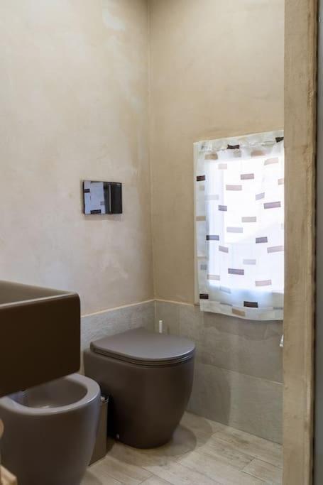 Casa Vacanze L'Angolo Fiorito Bettolle Kültér fotó